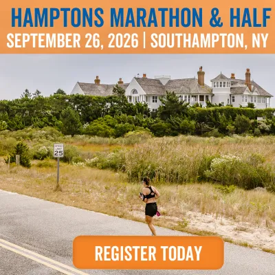 A female runner runs along a road with a large house and natural landscape in the background, with the text 'HAMPTONS MARATHON & HALF SEPTEMBER 26, 2026 | SOUTHAMPTON, NY' and 'REGISTER TODAY' overlaid.