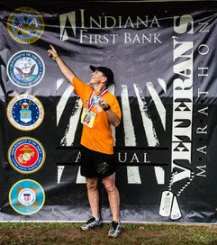InFirst Bank Veteran's Marathon, Half Marathon, and Marathon Relay logo