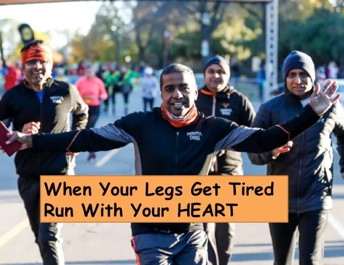 A group of runners, smiling and waving, cross the finish line of a race, with motivational text overlay.