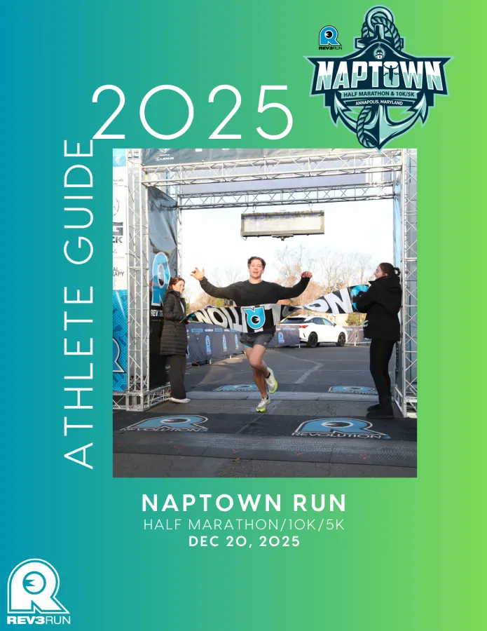 A runner celebrates crossing the finish line at the Naptown Run, with "ATHLETE GUIDE 2025" text on the left and race details at the bottom.