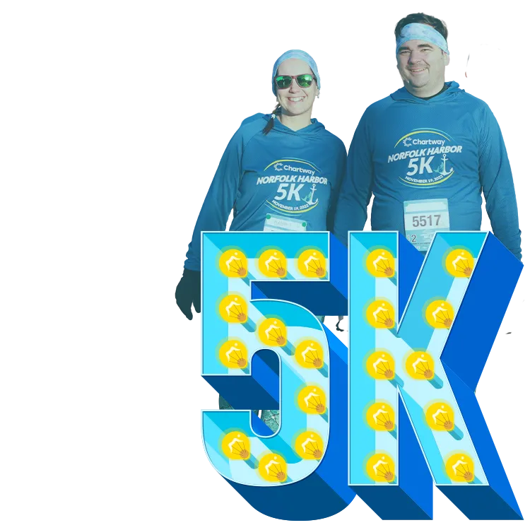 Two runners smiling, wearing Norfolk Harbor 5K shirts, with a large blue 5K graphic in the foreground.