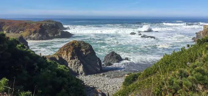 Scenic view of the Noyo Headlands coastline with waves crashing on the shore.