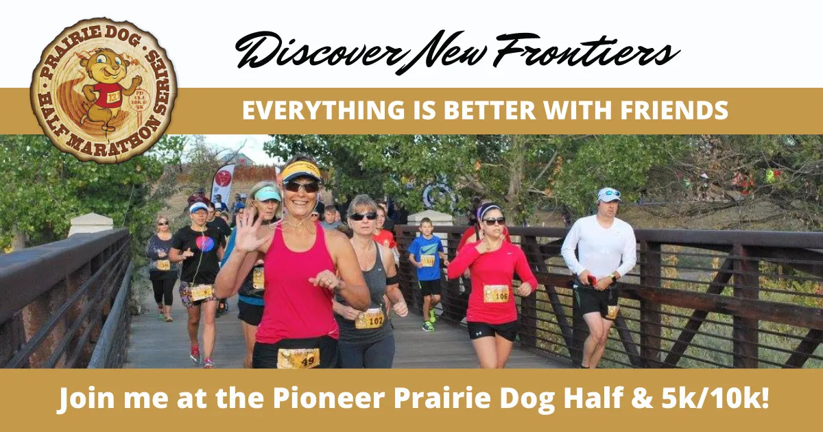 Runners crossing a bridge during the Pioneer Prairie Dog Half Marathon & 5k/10k.