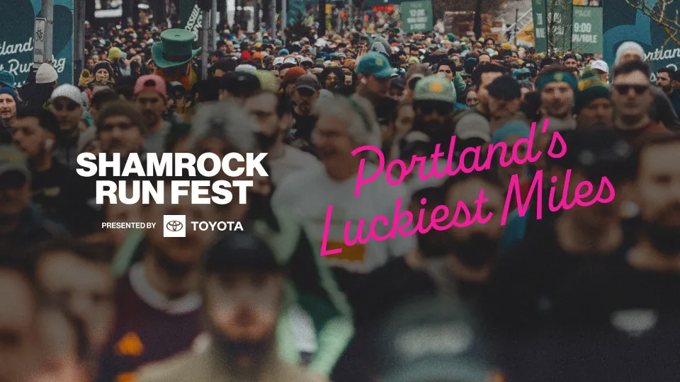 A large crowd of runners at the Shamrock Run Fest in Portland, with text overlay 'Portland's Luckiest Miles'.