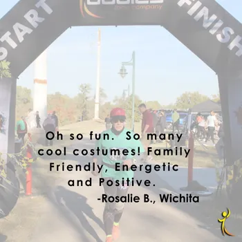 Runner in a green shirt and red hat running under a start/finish archway, with a quote overlay.