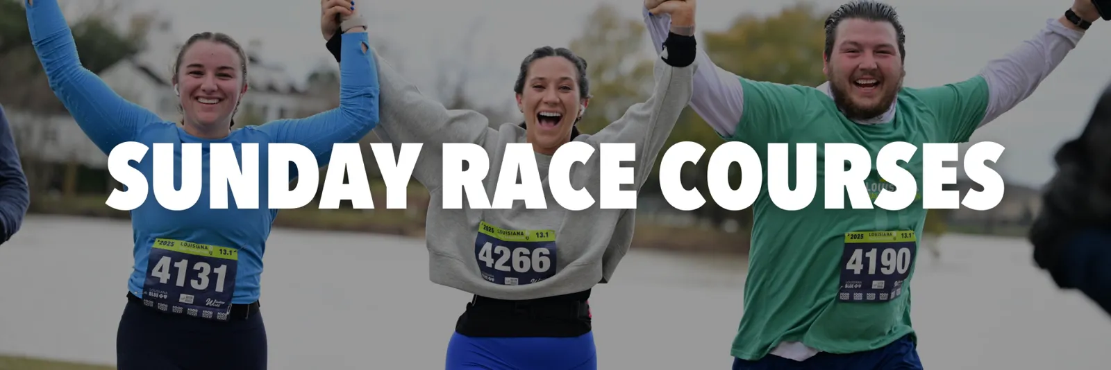 Three runners with their arms raised in celebration, wearing race bibs, with the text 'SUNDAY RACE COURSES' overlaid.