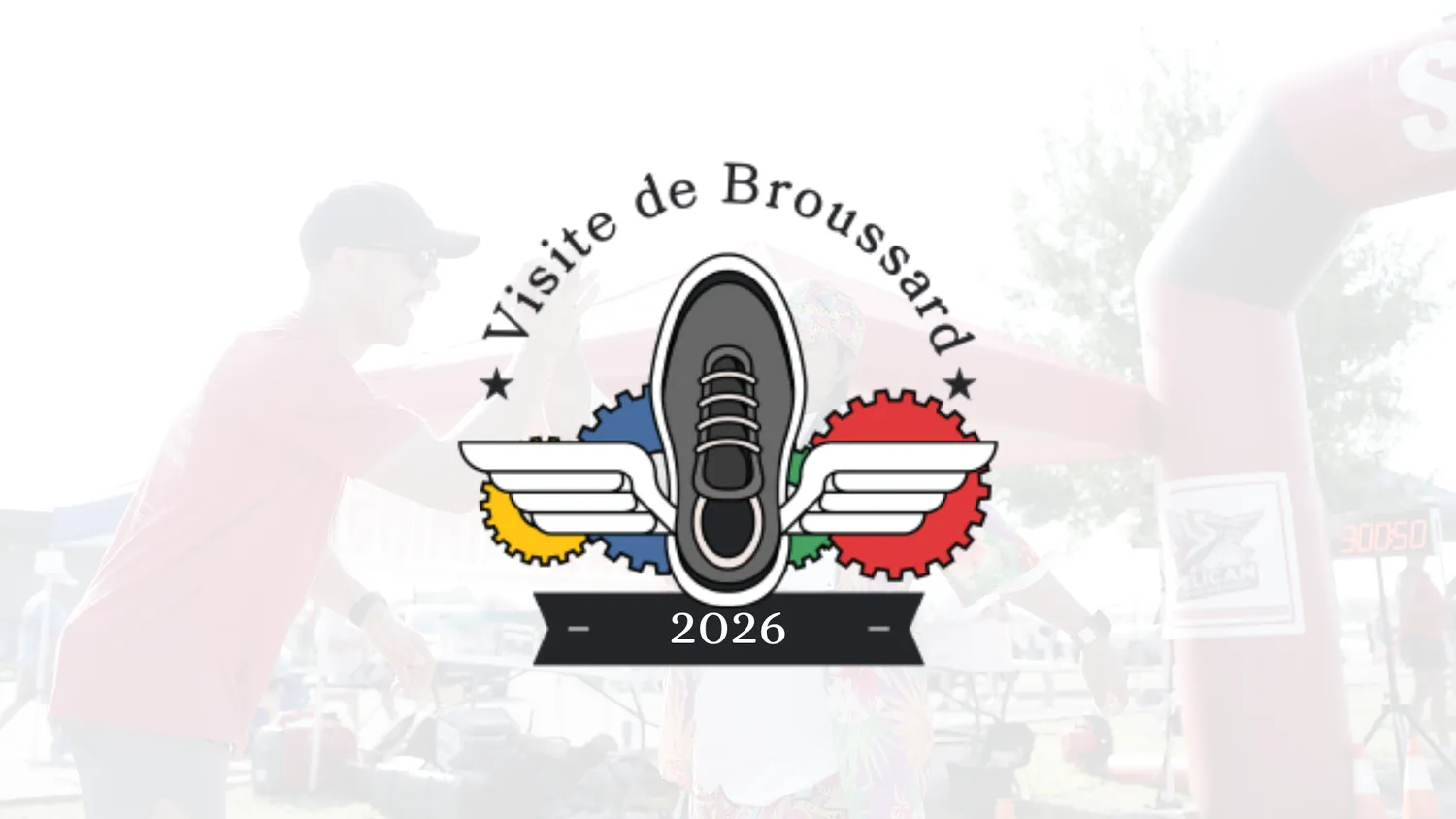 Runners celebrating at the start or finish line of the Visite de Broussard race, with the race logo and year 2026 visible.